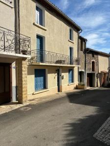 an empty street in front of a building at Spacious Village House in Ginoles with Garden in Ginoles