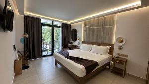 Ένα ή περισσότερα κρεβάτια σε δωμάτιο στο Coral Strand Smart Choice +82 φωτογραφίες