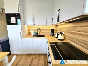 Kuchyň nebo kuchyňský kout v ubytování 365PAM - Apartament Flow z Ogrodem