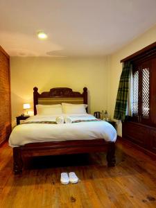 Ένα ή περισσότερα κρεβάτια σε δωμάτιο στο Hotel Nutopia