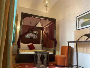 Posezení v ubytování Riad Deux Palmiers