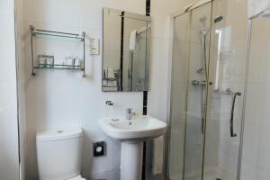 Koupelna v ubytování Malone 37 Apartments by Malone Hotel