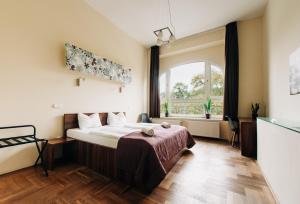 Una cama o camas en una habitación de SasOne & Sas Two & Sas HO