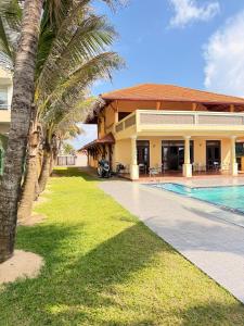 Bazén v ubytování Sunset Point Negombo nebo v jeho okolí