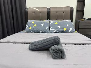 Postel nebo postele na pokoji v ubytování D 'Bukit Homestay Kok Lanas