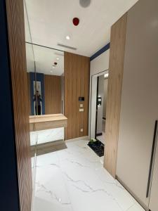 Una cama o camas en una habitación de Toshkent City Nest One