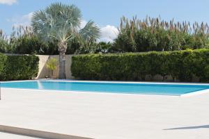 Bazén v ubytování Villetta di Nonna Giovanna nebo v jeho okolí + 33 fotografií