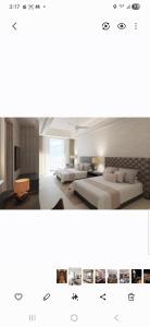 une grande chambre avec deux lits dans l'établissement 3 bd grand luxxe Spa, à Nuevo Vallarta