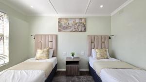 Giường trong phòng chung tại Amherst House +65 ảnh