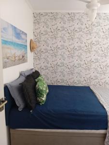 Ένα ή περισσότερα κρεβάτια σε δωμάτιο στο Beira mar 2 +23 φωτογραφίες