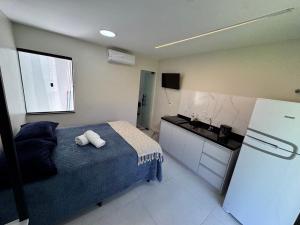 Η κουζίνα ή μικρή κουζίνα στο Studio Top no Residencial Porto Mar