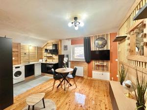 Kuchyň nebo kuchyňský kout v ubytování Petite Ours