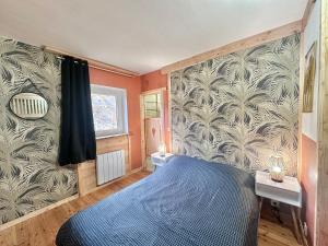 Postel nebo postele na pokoji v ubytování Petite Ours