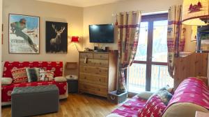 Μια τηλεόραση ή/και κέντρο ψυχαγωγίας στο Hostdomus - Pepita Apartment