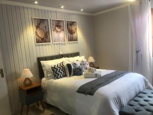 Postel nebo postele na pokoji v ubytování Casa perto do centro vale dos vinhedos, caminhos de pedra