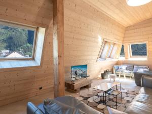 Posezení v ubytování Grand appart au centre de Chamonix avec Wifi et garage, proche des pistes - FR-1-343-229