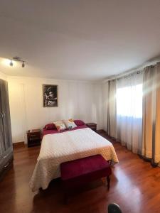 Ένα ή περισσότερα κρεβάτια σε δωμάτιο στο Entre cerros apartaments +19 φωτογραφίες