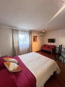 Ένα ή περισσότερα κρεβάτια σε δωμάτιο στο Entre cerros apartaments