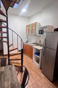 Η κουζίνα ή μικρή κουζίνα στο Entre cerros apartaments