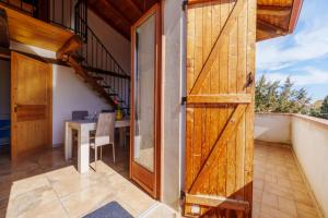 Balkón nebo terasa v ubytování Casa Cao Appartamento Il Ginepro