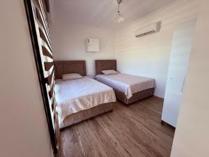 Postel nebo postele na pokoji v ubytování Villa with a full private pool + 51 fotografií