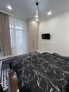 Postel nebo postele na pokoji v ubytování Однокомнатная квартира посуточно