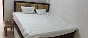 Postel nebo postele na pokoji v ubytování SK HOTEL & Restaurant