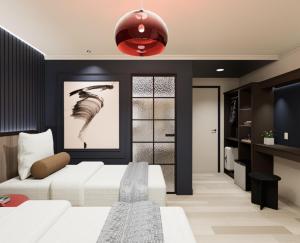 Ένα ή περισσότερα κρεβάτια σε δωμάτιο στο The Maximilian Hotel - Cebu