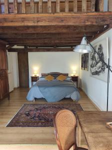 Posezení v ubytování Havre de paie en Sologne avec piscine