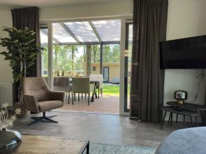 TV a/nebo společenská místnost v ubytování Samoza