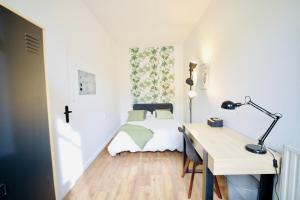 Ένα ή περισσότερα κρεβάτια σε δωμάτιο στο Modern & Hypercentre, Private Balcony