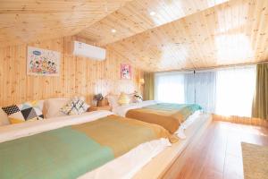 Voodi või voodid majutusasutuse 上海落云间酒店 toas +41 fotot