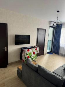 TV a/nebo společenská místnost v ubytování Sky Residences Condo