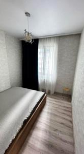 Postel nebo postele na pokoji v ubytování Sky Residences Condo + 2 fotografie