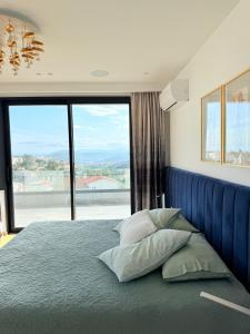 Voodi või voodid majutusasutuse Aurora Villa by A&D Properties toas +44 fotot