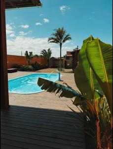 La alberca dentro o cerca de Pousada Toca da Coruja Chalé Grande