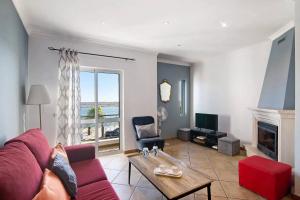 Et opholdsområde på Duplex Apartamento Tartaruga