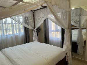 Ένα ή περισσότερα κρεβάτια σε δωμάτιο στο Lakeview Apartments - Serene Mustard