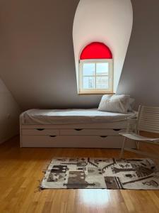 Ένα ή περισσότερα κρεβάτια σε δωμάτιο στο Ekjoviki