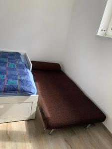 Postel nebo postele na pokoji v ubytování Südstadt Appartment