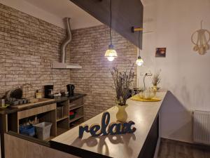 Η κουζίνα ή μικρή κουζίνα στο Pensiunea Glasul Pădurii