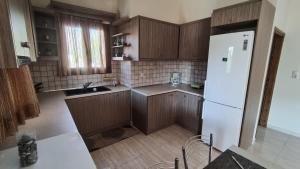 Kuchyň nebo kuchyňský kout v ubytování Sklavaki Traditional Villa - Private Pool & Views + 36 fotografií