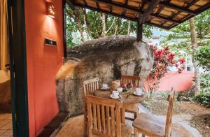 Κήπος έξω από το Pousada Vila das Pedras