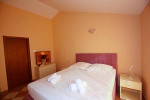 Postel nebo postele na pokoji v ubytování Apartman Vali Crikvenica + 13 fotografií