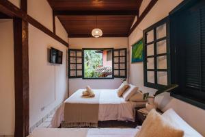 Μια τηλεόραση ή/και κέντρο ψυχαγωγίας στο Pousada Vila das Pedras