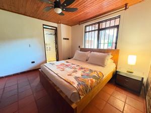 Postel nebo postele na pokoji v ubytování Farm in Montenegro, Quindío + 25 fotografií