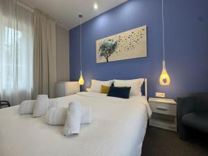 Postel nebo postele na pokoji v ubytování Garden Bungalow