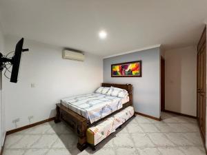 En eller flere senge i et værelse på Apartamento MI ATARDECER