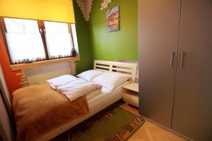 Llit o llits en una habitació de Apartamenty Paradis Zakopane