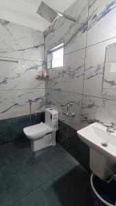 Koupelna v ubytování JOHNs' Paradise